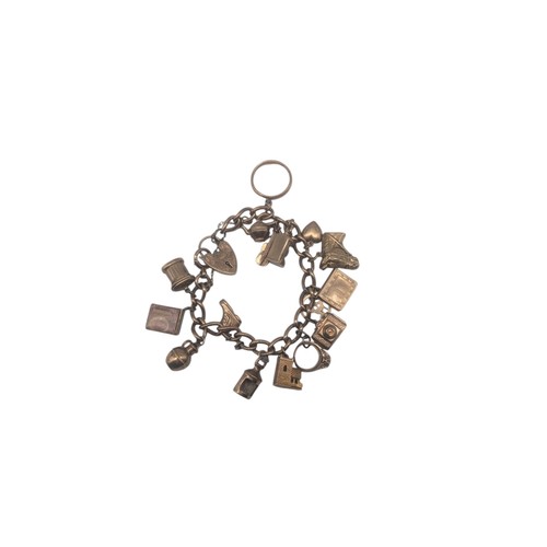 46 - 9ct Yellow Gold Charm Bracelet 16 Charms.
weight 40.32g