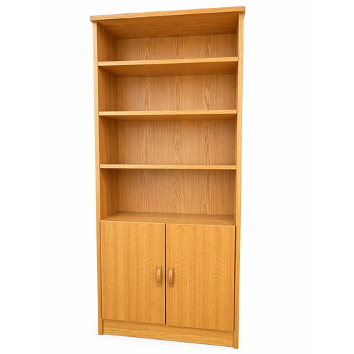 441A - Mid Century bookcase, the open shelves above two cupboard doors