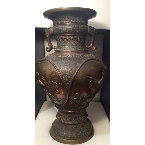 107 - Large Bronze Chinese vase with dragon handles & 6 figure signature to base.