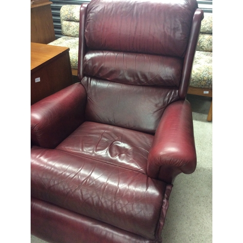 155 - Oxblood red electric recliner.