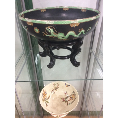 162 - Large early ceten bowl on wooden stand,plus 1 other.