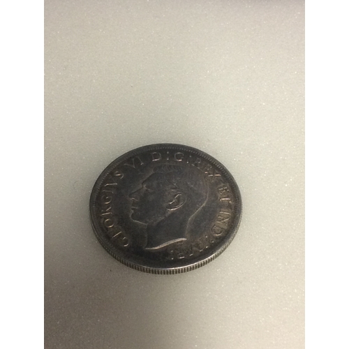 26 - Canada silver dollar dated 1935.