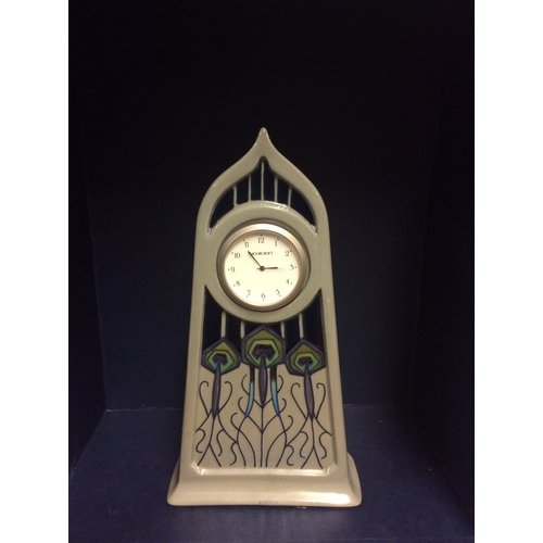 176 - Moorcroft art nouveau mantle clock. 23 cm high.