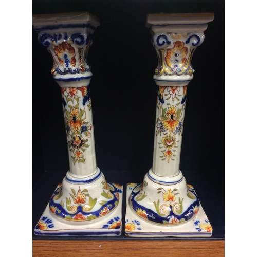 185 - Pair of Tin glazed Faience Candle sticks.