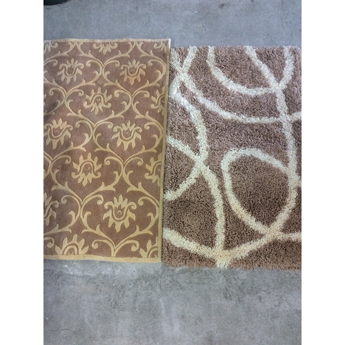 216 - 2 modern rugs.