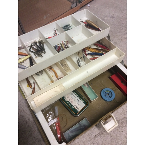 220 - Fishing tackle box and contents.