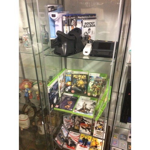 227 - 3 shelf’s Of Xbox 360 games, psp games ,do and PlayStation games etc.