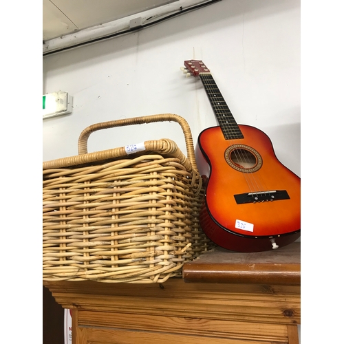 326 - Large wicker egg basket & ukulele.