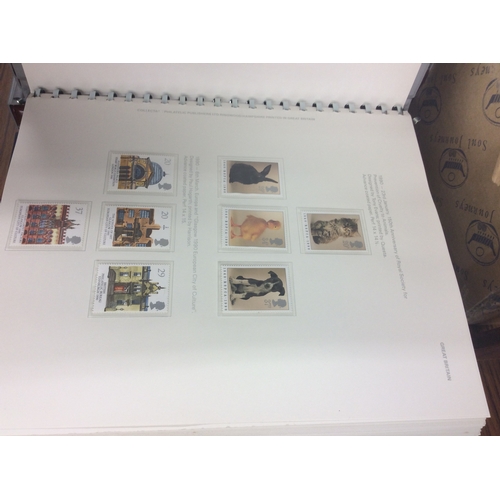 258 - 2 albums of Great Britain mint stamps.