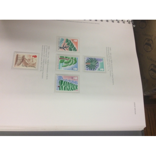 258 - 2 albums of Great Britain mint stamps.