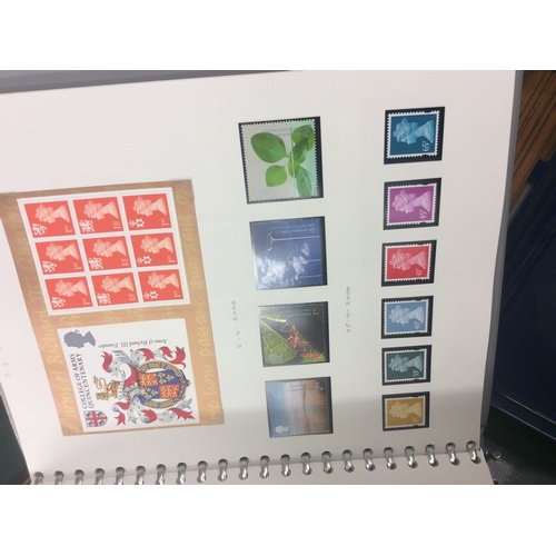 258 - 2 albums of Great Britain mint stamps.