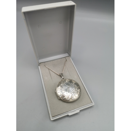 92 - Heavy Italian 925 silver chain with locket pendant.