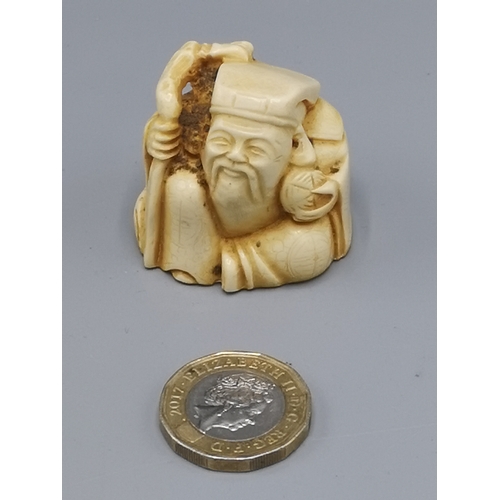 16 - Chinese man netsuke.