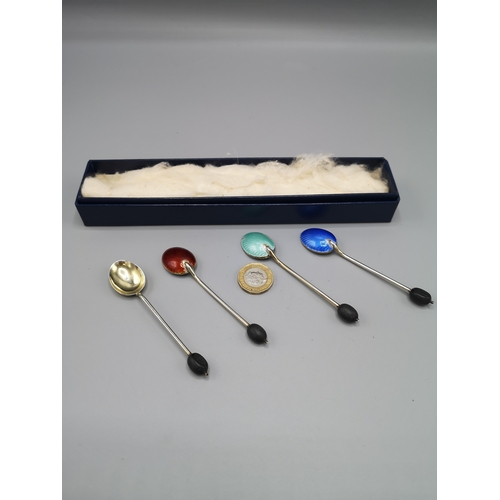 30 - Set of 4 silver and enamel spoons.