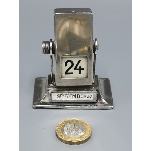 32 - Solid silver hall marked  Rotating callendar.