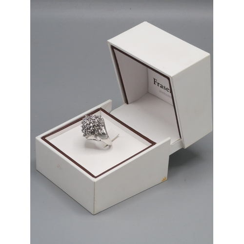 376 - Large 14kt white gold diamond cluster  ring .