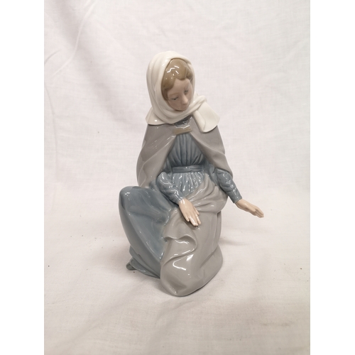 373 - Nao girl kneeing figure.