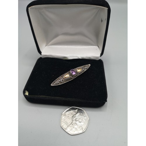 28 - Silver 925 art deco brooch with amethyst stone.