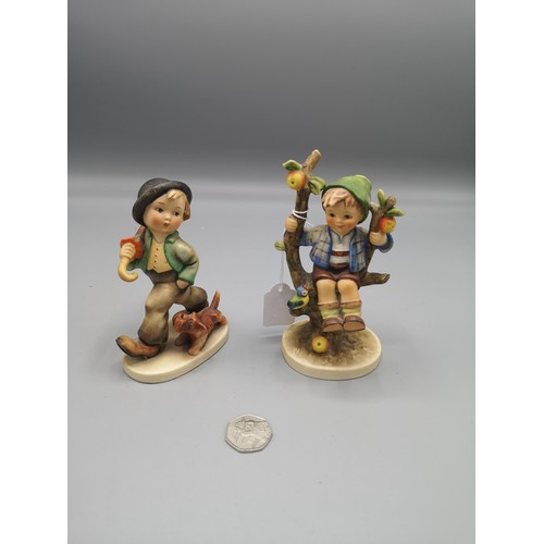 49 - 2 large hummel figures.