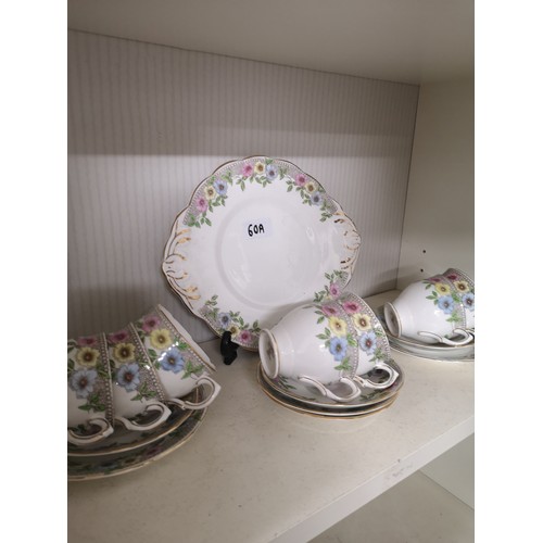 60a - Flower pattern tea set.