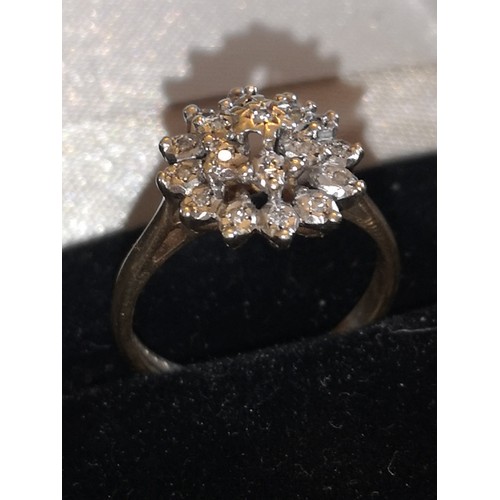 100B - 9ct 375 Hall Marked diamond cluster ring.