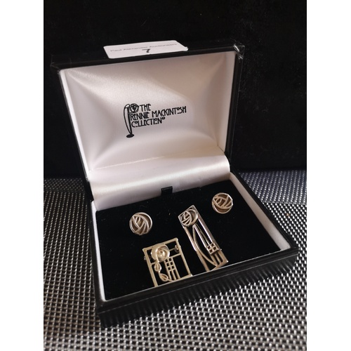 7 - Silver rennie macintosh 2 brooch set with matching earrings.