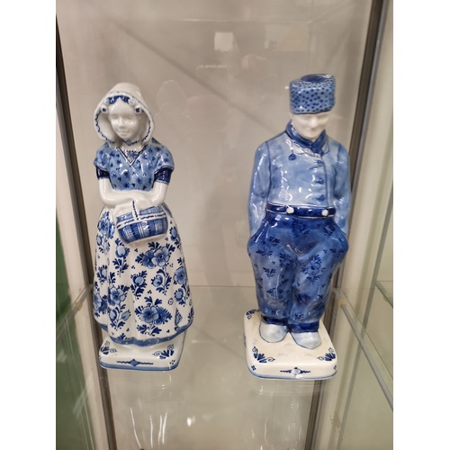 12a - Pair of rare Delft man and woman figures.