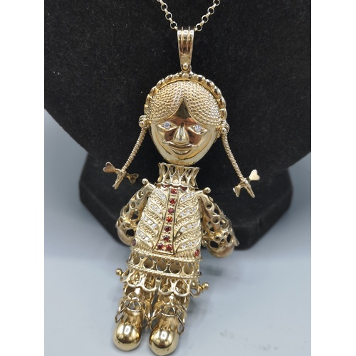 253 - Large silver 925 on gilt chain and large doll moveable pendant in stunning condition.