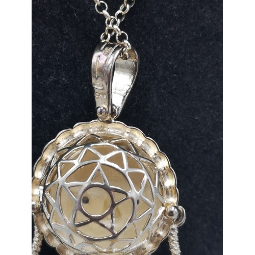 253 - Large silver 925 on gilt chain and large doll moveable pendant in stunning condition.