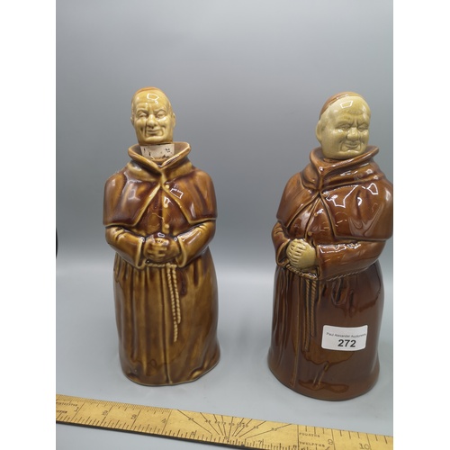 272 - Pair of tin glazed monk decanters.