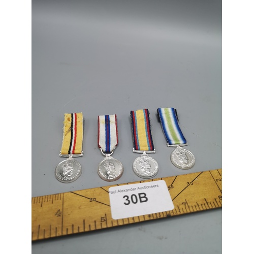 30b - Set of 4 military dress medals.