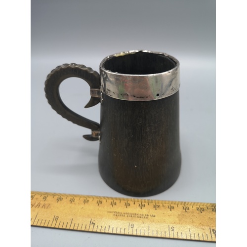 33 - Scottish horn arts and crafts tankard with silver rimmed topped.