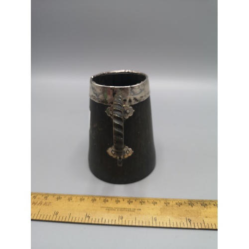 33 - Scottish horn arts and crafts tankard with silver rimmed topped.