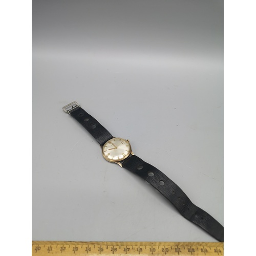 3a - 9ct gold 375 hall marked Avia watch with leather strap.