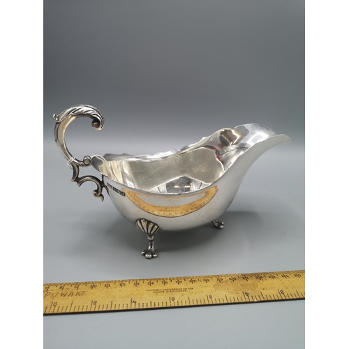 12 - Large heavy silver hall marked gravy boat makers H&W .