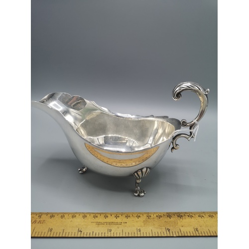 12 - Large heavy silver hall marked gravy boat makers H&W .