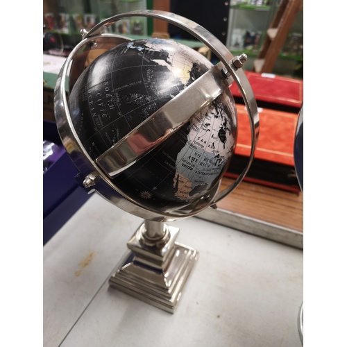 129f - Small globe on stand .