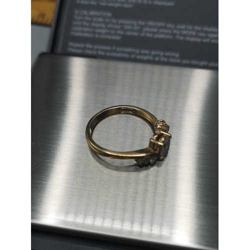4 - 9ct gold 375 hall marked ring with stones