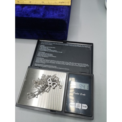 38a - Lot of silver necklaces one as found together with pendant.