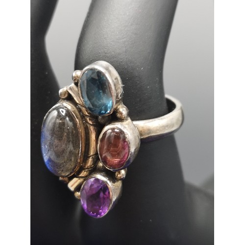 49 - Stunning silver ring with stones.