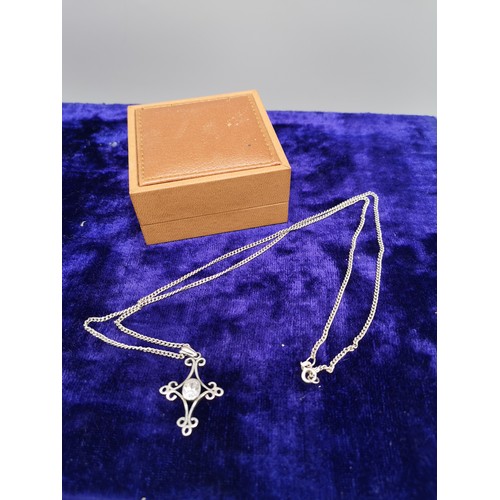 30c - Celtic silver cross with stone with chain .