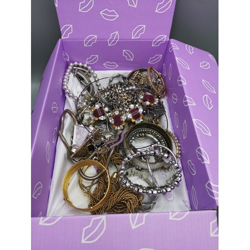 28a - Large lot of gold coloured and costume jewellery.