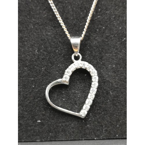 109 - 2 silver chain s with pendant s.