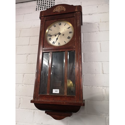 225 - Oak wall clock with pendulum.