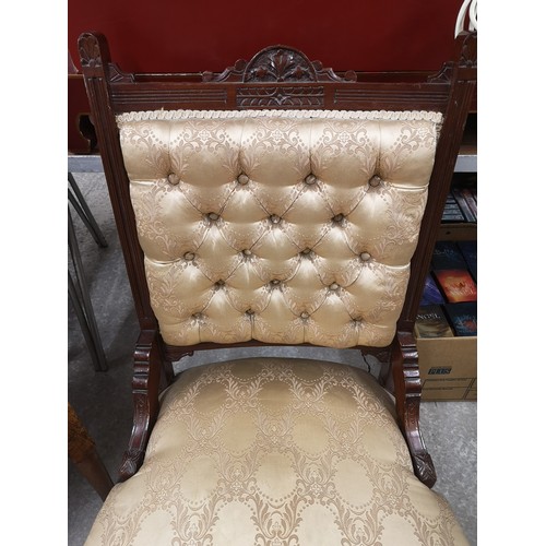 67 - Stunning button back antique nursing chair with silk upholstery.