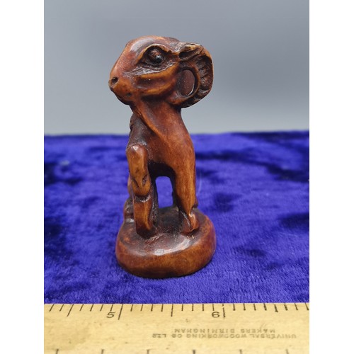 73 - Netsuke of mountain goat.