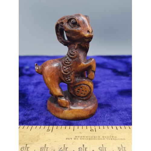 73 - Netsuke of mountain goat.