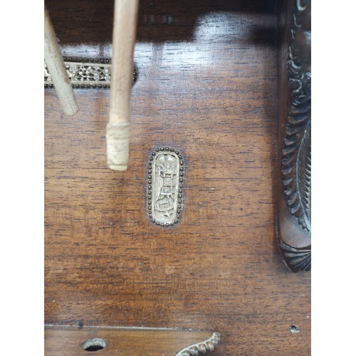 87 - Large black forest heavily carved pipe rack with inlays include s smoking pipes & 1900s bone cup.