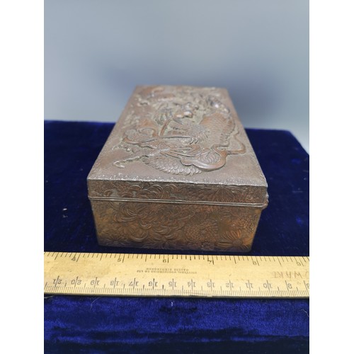 89 - Large heavy Chinese metal box depicting dragon  with wooden liner.