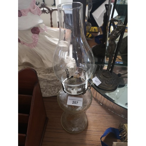 207 - Clear glass oil lamp with glass shade.